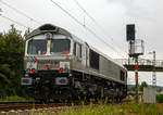 br-266-class-66-emd-jt-42-cwrm/707863/die-rheincargo-de-669-92-80 
Die RheinCargo DE 669 (92 80 1266 069-4 D-RHC), ex HGK DE 669, ex HGK DE 169, fährt am 03.08.2020 als Lz durch Bad Honnef in Richtung Süden. 
Die RheinCargo GmbH & Co. KG (RheinCargo) ist ein Gemeinschaftsunternehmen der Häfen und Güterverkehr Köln AG (HGK) und der Neuss-Düsseldorfer Häfen GmbH & Co. KG (NDH), die zu jeweils 50 % Eigentümer sind.

Die Lok wurde 2003 von EMD (Electro-Motive Division eine Tochter von General Motors) unter der Fabriknummer  20028453-2 gebaut, Eigentümer und Vermieter ist die Beacon Rail Leasing Ltd in London.

Die Lok ist eine EMD JT42CWR (auch bekannt als Class 66). Diese sind diesel-elektrische 6-achsige Schwerlastlokomotive. Sie besitzt einen 12 Zylinder 2-Takt-Turbodieselmotor vom Typ 12N-710G3B-EC, der einen Generator vom Typ EM AR8/CA6 antreibt der wiederum den Strom für die 6 Gleichstrommotoren vom Typ D43TR erzeugt welche die 6 Achsen angetrieben. Die Lokomotive wird von einem Board-Computer (EM 2000) überwacht und verfügt über verschiedene Mess- und Diagnosefunktionen. Die Lokomotive hat Zulassungen für Deutschland und Belgien.

Die JT42 CWR basiert auf der Entwicklung der 70er Jahre. Die Lokomotive erweist sich als eine grundsolide Baureihe, die dank dem einfachen Design und den Gleichstromantriebsmotoren einen zuverlässigen Posten in jeder Flotte darstellt. Die dreiachsigen HTCR-E Drehgestelle verfügen über gegenläufig radialgelenkte Endachsen, die Mittelachse ist seitenverschiebbar, diese ermöglichen den Betrieb dieser 6-achsigen-Lokomotive auf Strecken die in der Regel auf 4-achsige Lokomotiven eingeschränkt sind (Kleinster befahrbarer Radius 80 m). Die seitlichen Schiene-Kräfte sind dadurch auch gesenkt.
 
TECHNISCHE DATEN: 
Achsfolge: Co`Co`
Spurweite: 1.435 mm
Länge über Puffer: 21.349 mm
Drehzapfenabstand: 14.140 mm 
Breite: 2.692 mm
Höhe: 3.912 mm
Gewicht: 126 t
Dieselmotorleistung:  2.462 kW (ca. 3.200 PS)
Motorbauart:  V 12-Zylinder-2-Takt-Turbodieselmotor 
Motortyp:  12N-710G3B-EC
Drehzahl: 235 – 904 U/min
Tankinhalt: 6.400 l
Generator: AR8/CA6 
Fahrmotoren: 6 Stück D43TRC (DC / Gleichstom)
Leistung an den Rädern: 2.268 kW / 3.072 PS
Höchstgeschwindigkeit: 120 km/h
Anfahrzugskraft: 400 kN

